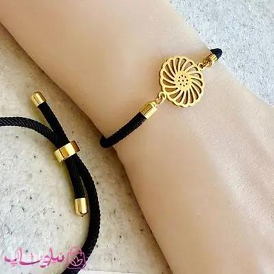 دستبند زنانه آسانسوری بندی مشکی با پلاک طلایی مدل خورشید کد 159